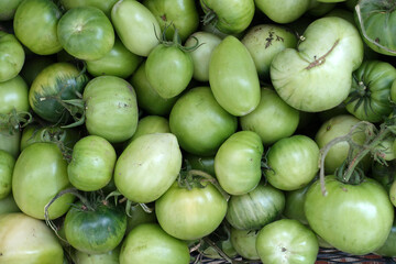 close-up village tomatoes in a bowl, hormone-free and non-GMO tomatoes,