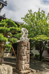 Statue in  the Garden of Chokoku Temple in Tokyo, Japan

