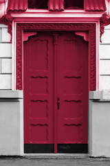 closeup of old color door. New 2023 trending PANTONE 18-1750 Viva Magenta colour