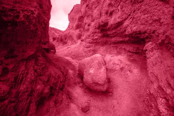 Trendy Color of the year 2023: Viva Magenta toned colorful eroded landform of Altai mountains