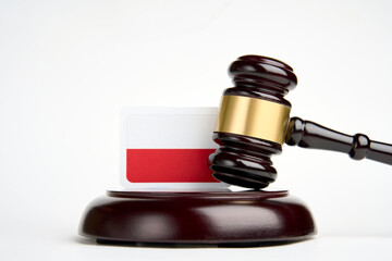Legal law concept image, judge gavel and flag of Poland