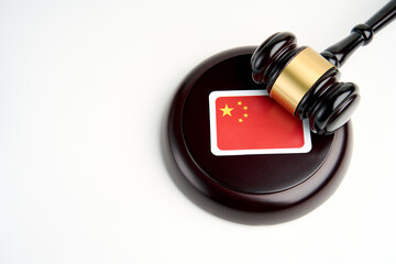 Legal law concept image, judge gavel and flag of China