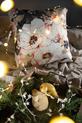 Beautiful gifts and sweet under the Christmas tree. New Year's decor. Preparation for the holiday. Many gifts on a dark background.