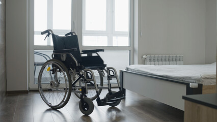 Wheelchair in hospital room, life with disability, elderly care, nursing home