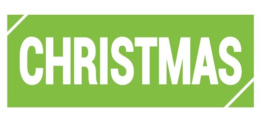 CHRISTMAS text written on green stamp sign.
