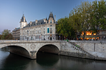 Cityscape of Paris by the Seine river at down. France