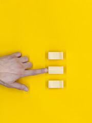 an empty wooden cube that can record letters