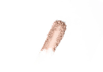 Nude eye shadow, powder Swatche isolated on white background. Texture of crumbled and crushed cosmetics