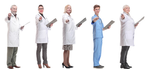 full length group of doctors with notepad isolated