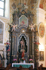 Fototapeta na wymiar Altar of the Passion of Jesus in the parish church of Our Lady of the Snow in Kutina, Croatia