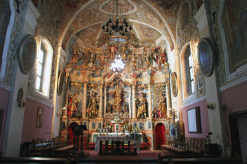 Fototapeta na wymiar The main altar in the parish church of Our Lady of Snow in Kutina, Croatia