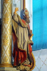 Obraz premium Statue of the Saint on the main altar in the parish church of the Holy Trinity in Radoboj, Croatia