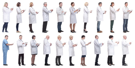 Obraz premium group of doctors with clipboard isolated on white