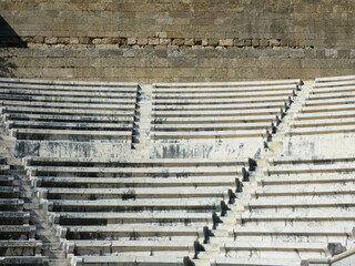 Odeon a classic greek open-air theatre.
Old theater with marble seats and stairs. The Acropolis of...