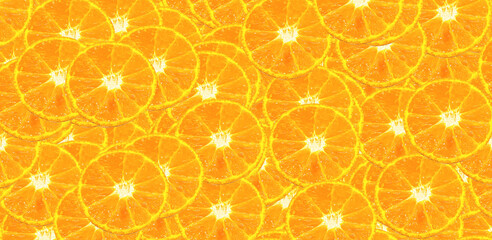 Half sliced of orange pattern background. Fresh fruit and colorful wallpaper concept.