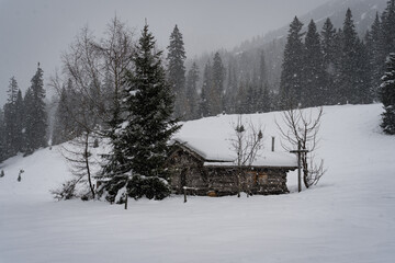 Mountain hut in winter wonderland