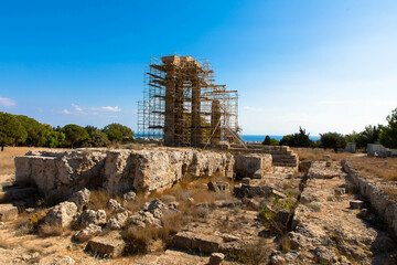 Monte Smith Acropolis of Rhodes. Part of the three-and-a-half column peripteral temple was rebuilt, but is now supported by a steel framework to prevent it from collapsing. Greece.