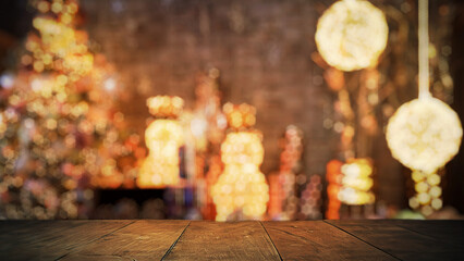 Empty wood table top with blur Christmas tree with bokeh light background free space for product 
