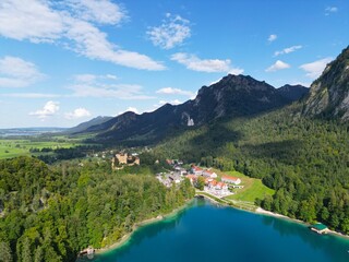 Alpsee Lake in Germany near Fussen drone aerial view .