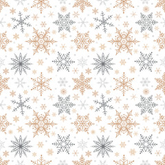 Seamless Christmas pattern of gold and silver snowflakes. Vector illustration.