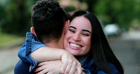 Fototapeta premium Woman embracing boyfriend, loving caring relationship, couple reunion