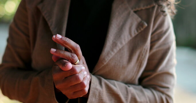 Uncertain Black Woman Feeling Overwhelmed Fidgeting With Hands