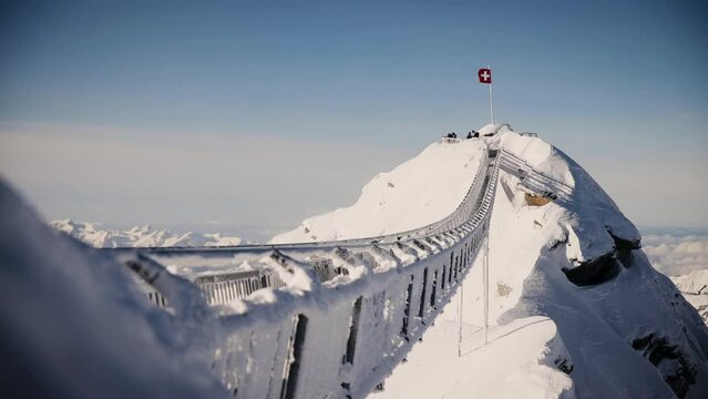 Peak Walk is a pedestrian suspension bridge linking two mountain peaks in the Swiss Alps on an altitude of 3000 meters. Steadicam shot