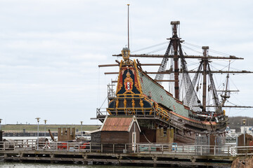 Historic ship at the harbor of Batavia in the Dutch city of Lelystad in Flevoland. - obrazy, fototapety, plakaty