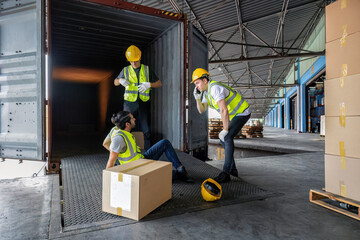 Worker carry carton box taken from 40 feet steel container got accident drop box to floor injury