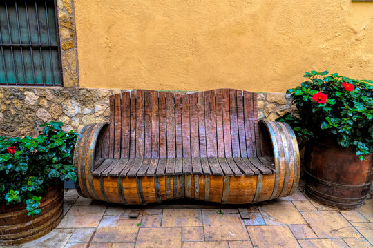 Bench seat made from wine barrels Falset old town Priorat region Catalonia Spain famous for its wine