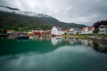 Fototapeta na wymiar The harbor of the village of Solvorn Norway on a cloudy day 