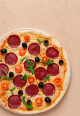 Pepperoni pizza, with olives and cherry, homemade, on a beige background, top view, no people,