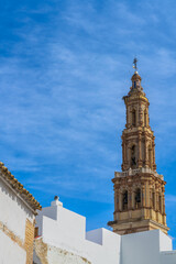 Obraz premium Tower of the church of San Gil in the city of Ecija in Seville, Andalusia, Spain.