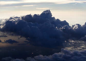 Cumulus Clouds Near Sunset From Commercial Airplane