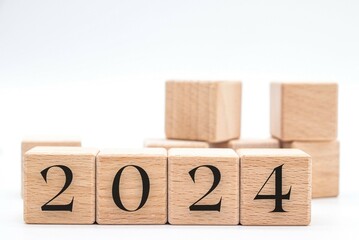 The number 2024 in wooden block cubes isolated on a white background. new year concept