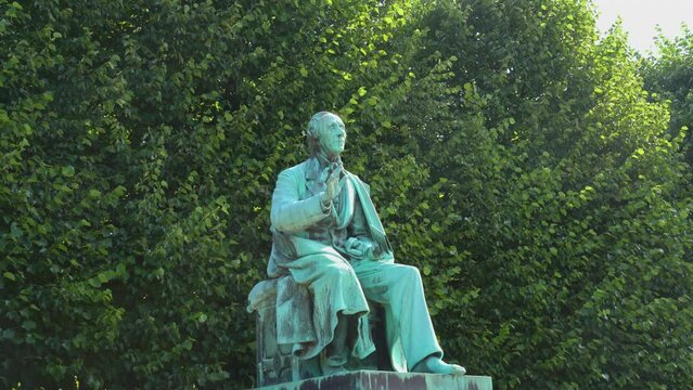Statue of Hans Christian Andersen, danish fairy tales writer in a park in Copenhagen, Denmark