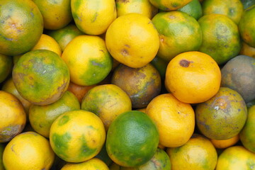 Ripe oranges as background, Sweet ripe oranges are sold in traditional markets