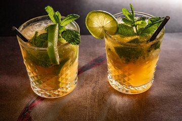 Two glasses with mojito on the table