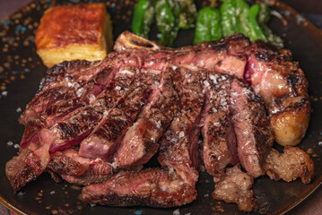 Grilled Ribeye steak with blood close-up