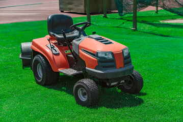 Obraz premium Professional lawn mower on the football field
