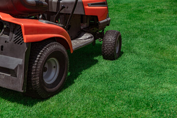 Professional lawn mower on the football field