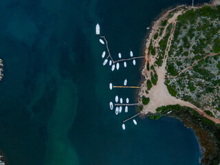aerial imagery 4k of land and sea with boats