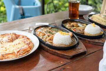 Homemade Pizza along with other dishes