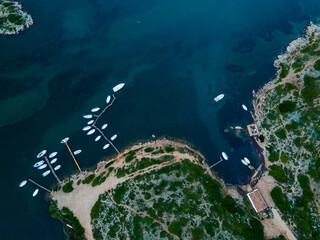 aerial imagery 4k of land and sea with boats