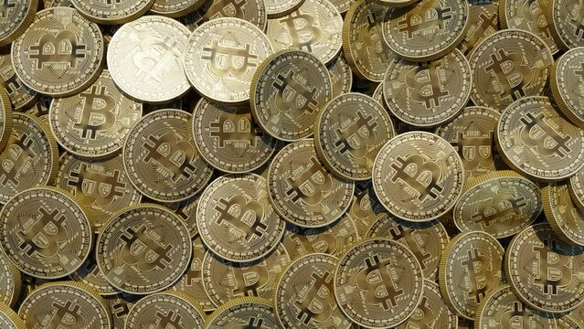 Bitcoin golden coins scattered texture pattern background. Crypto web 3 metaverse. Digital gold BTC treasure blockchain 3d rendered CGI video clip.