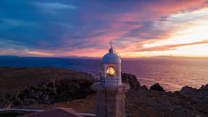 4k drone aerial views of the Punta Nati lighthouse in the Balearic archipelago, off the coast of Europe.