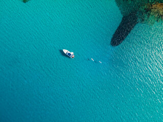 aerial imagery 4k of land and sea with boats