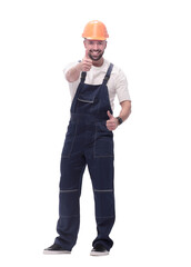 smiling man in overalls showing thumbs up . isolated on white
