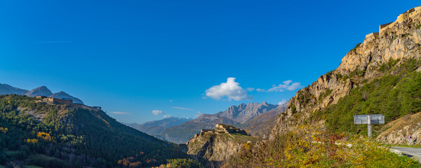 Naklejka na ściany i meble Landscape in the French southern alps in the middle of a large valley in autumn