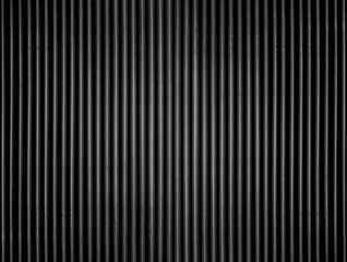 Black and white striped background. Metal facade